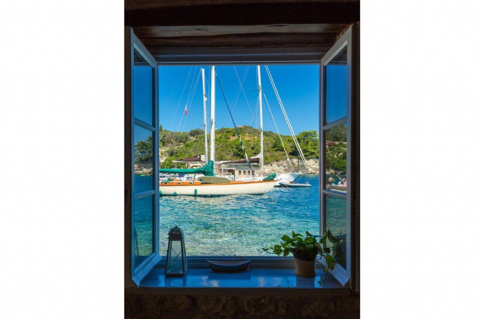 Spiros Jetty House Apartment Longos  Bagian luar foto